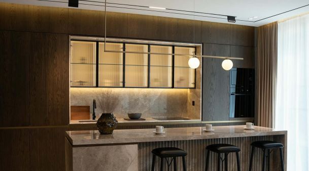 LED lighting in a high-end brown toned kitchen
