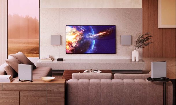 Space scene on a tv in a living room with a sony tv on the wall