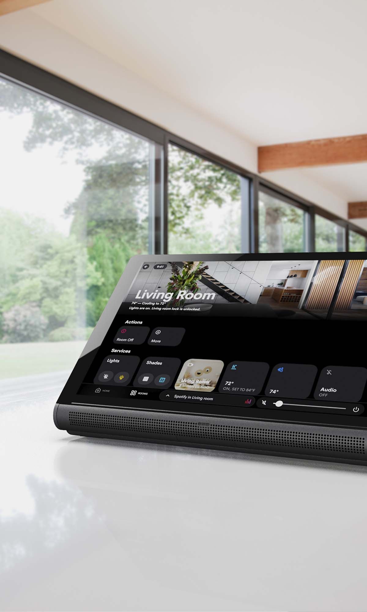 crestron touch panel sitting on a counter in a large room